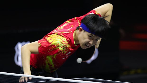 Wang Chuqin of China serves against Lim Jonghoon of Republic of Korea (Photo b