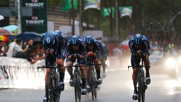 BARCELONA, SPAIN - AUGUST 26: Romain Bardet of France, Romain Combaud of France, Lorenzo Milesi of Italy, Alberto Dainese of Italy, Sean Flynn of The United Kingdom, Chris Hamilton of Australia, Oscar Onley of The United Kingdom, Max Poole of The United Kingdom and Team DSM - firmenich sprint during the 78th Tour of Spain 2023, Stage 1 a 14.8km team time trial stage from Barcelona to Barcelona / #UCIWT / on August 26, 2023 in Barcelona, Spain. (Photo by